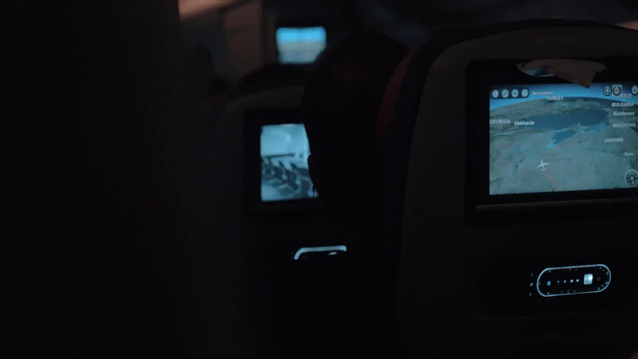 Inside the airplane traveling at night