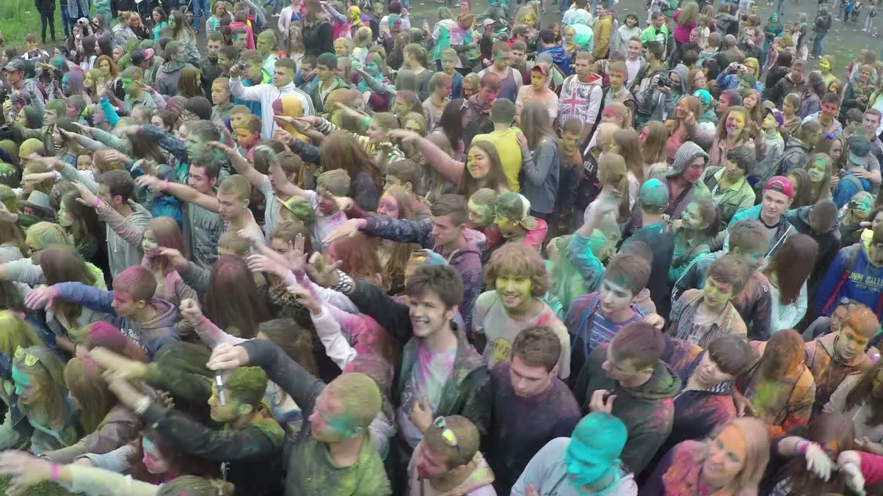 Flying over young people dancing on Colors Festival