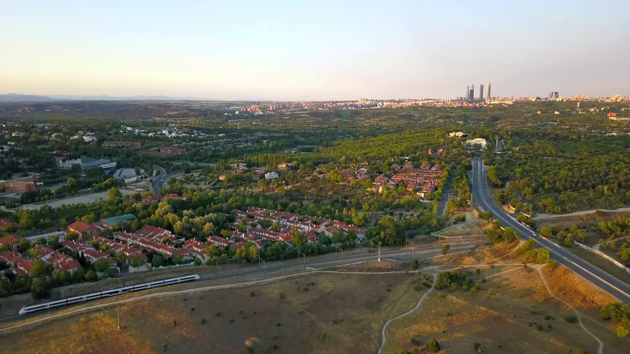 Scenic cinematic aerial view of Renfe train crossing