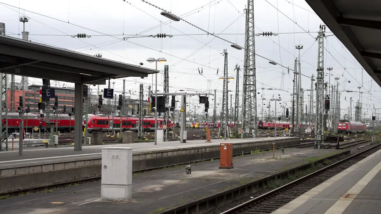 Frankfurt Main Station Platforms With Overhead Electric Power Lines And Regional Trains In Background