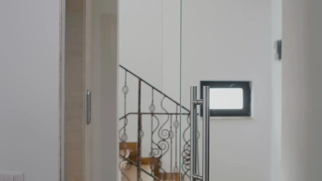 Businesswoman climbing stairs carrying takeaway food order bag during takeout lunchtime