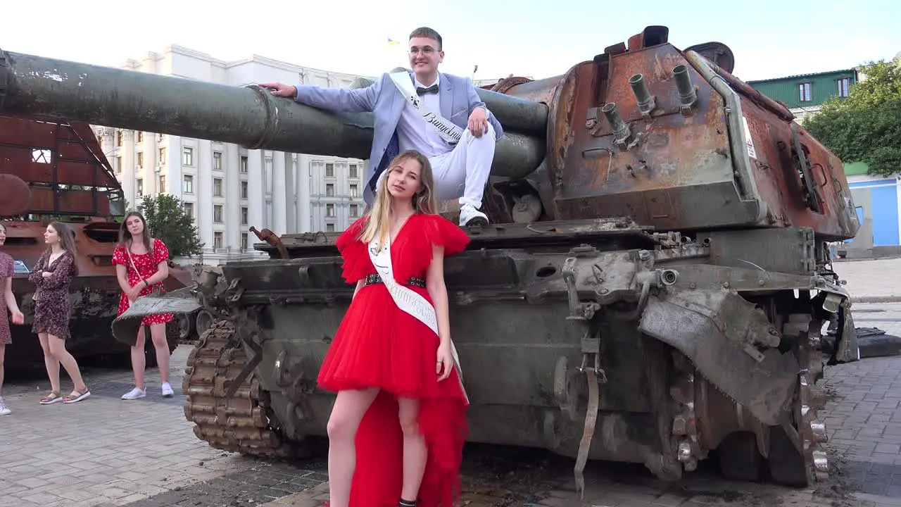 High School Graduates Pose In Front Of Destroyed Russian Tanks In Downtown Kyiv Kiev Ukraine