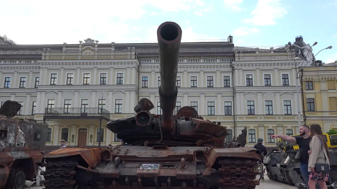 Tourists And Ukrainians Admire The Wreckage Of Captured Russian War Equipment In The Government District Of Kyiv Kiev Ukraine