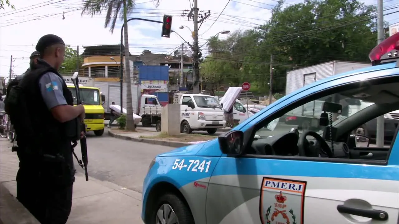 police check point in front at favela da rocinha in rio de janeiro