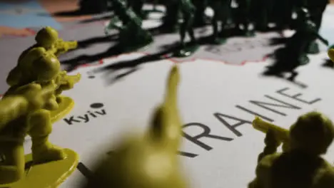 Tracking Shot Over Toy Soldiers On Map of Ukraine 02