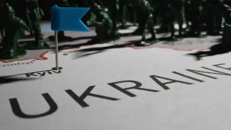 Tracking Shot Over Toy Soldiers On Map of Ukraine 06