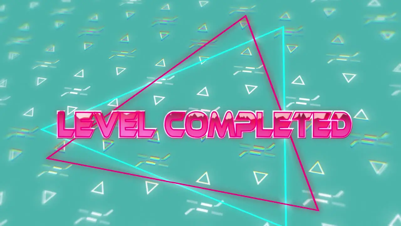 Animation of level completed and triangles over green background with triangles