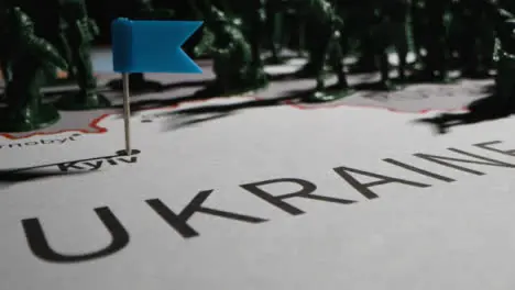 Tracking Shot Over Toy Soldiers On Map of Ukraine 07