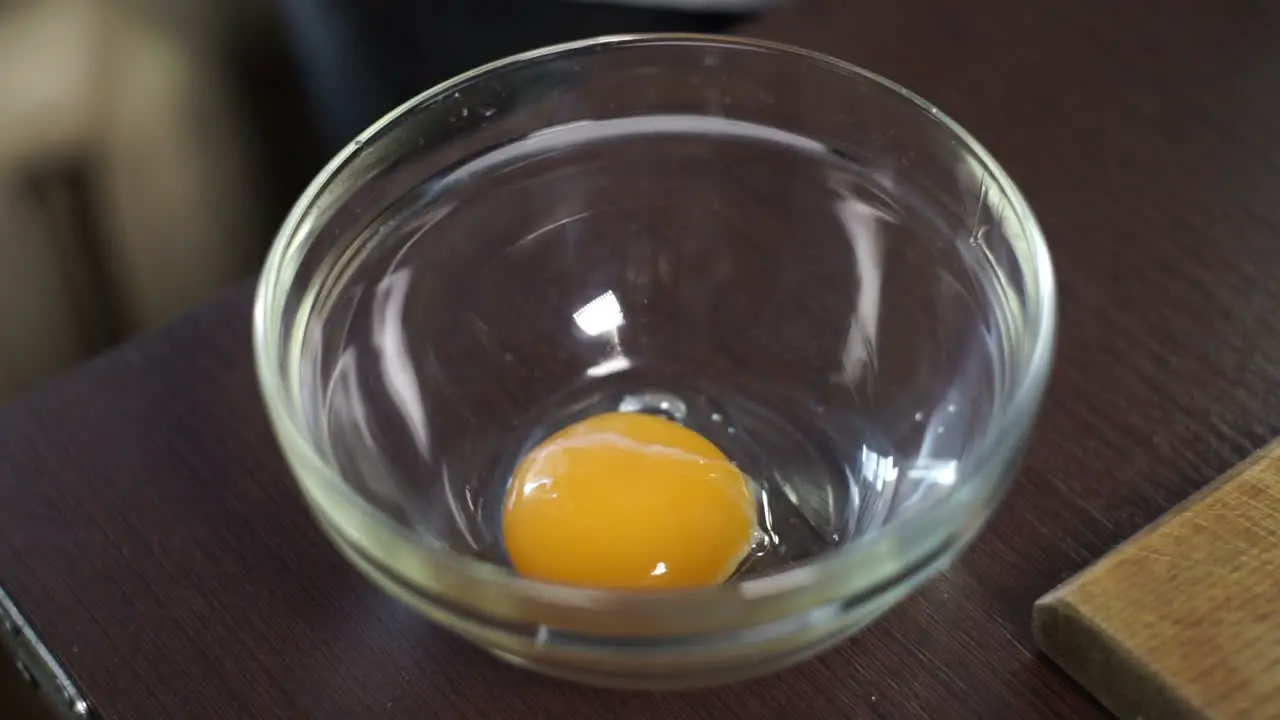 Cooking food Fresh organic eggs falling into bowl Food ingredient