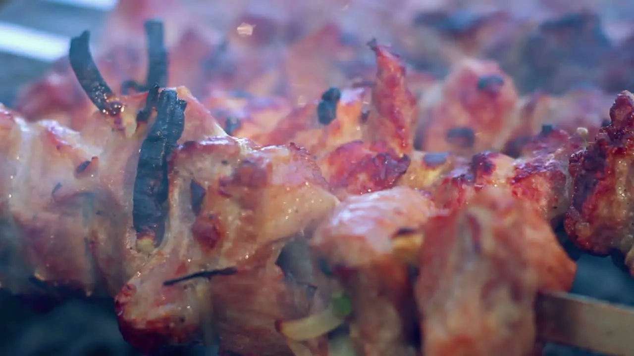 Grilled meat prepared on wood coal Meat with a ruddy crust Close up