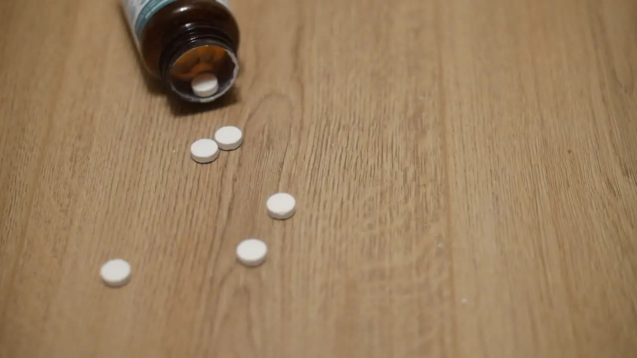 Jar of pills falls to the floor