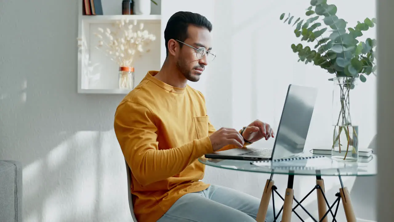 Remote work laptop and happy business man typing