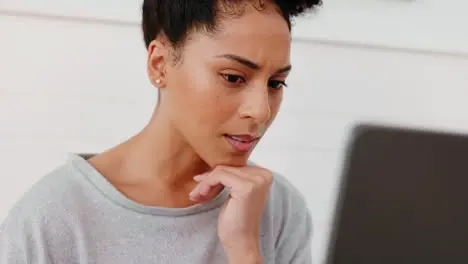 Stress confused and woman on a laptop working