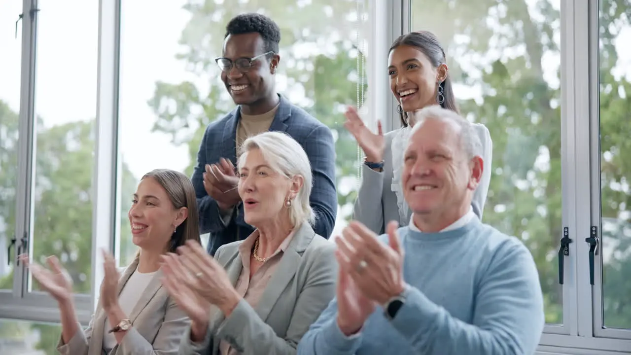 Applause pride and business people in a seminar