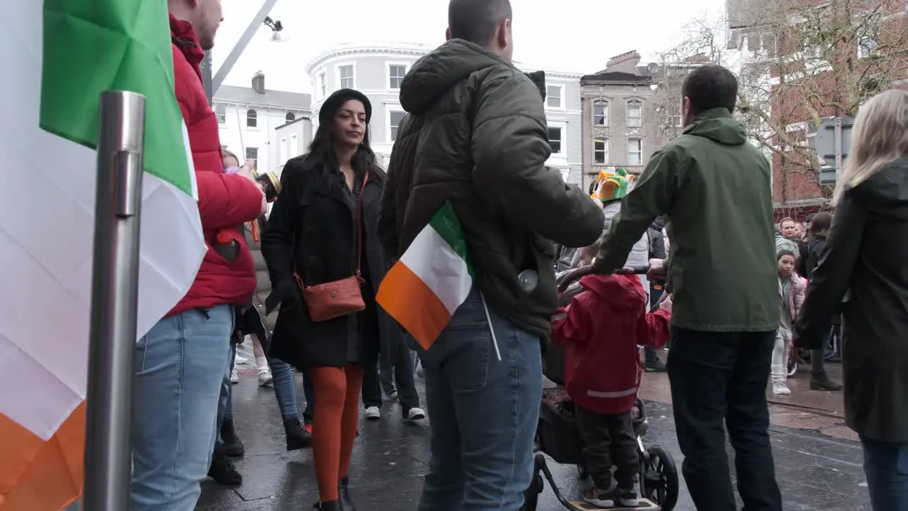 Irish flags and crowds gathered to watch St