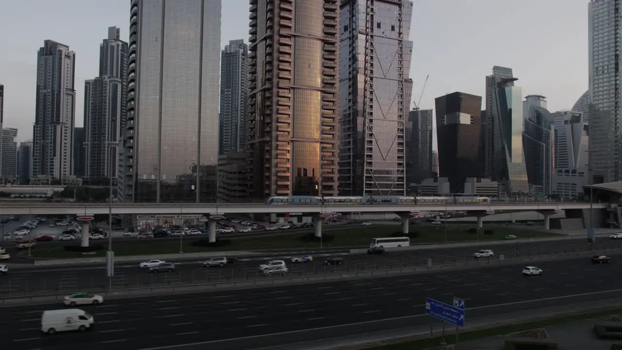 A lot of cars and busy traffic on Shiekh Zayed road in Dubai during sunset