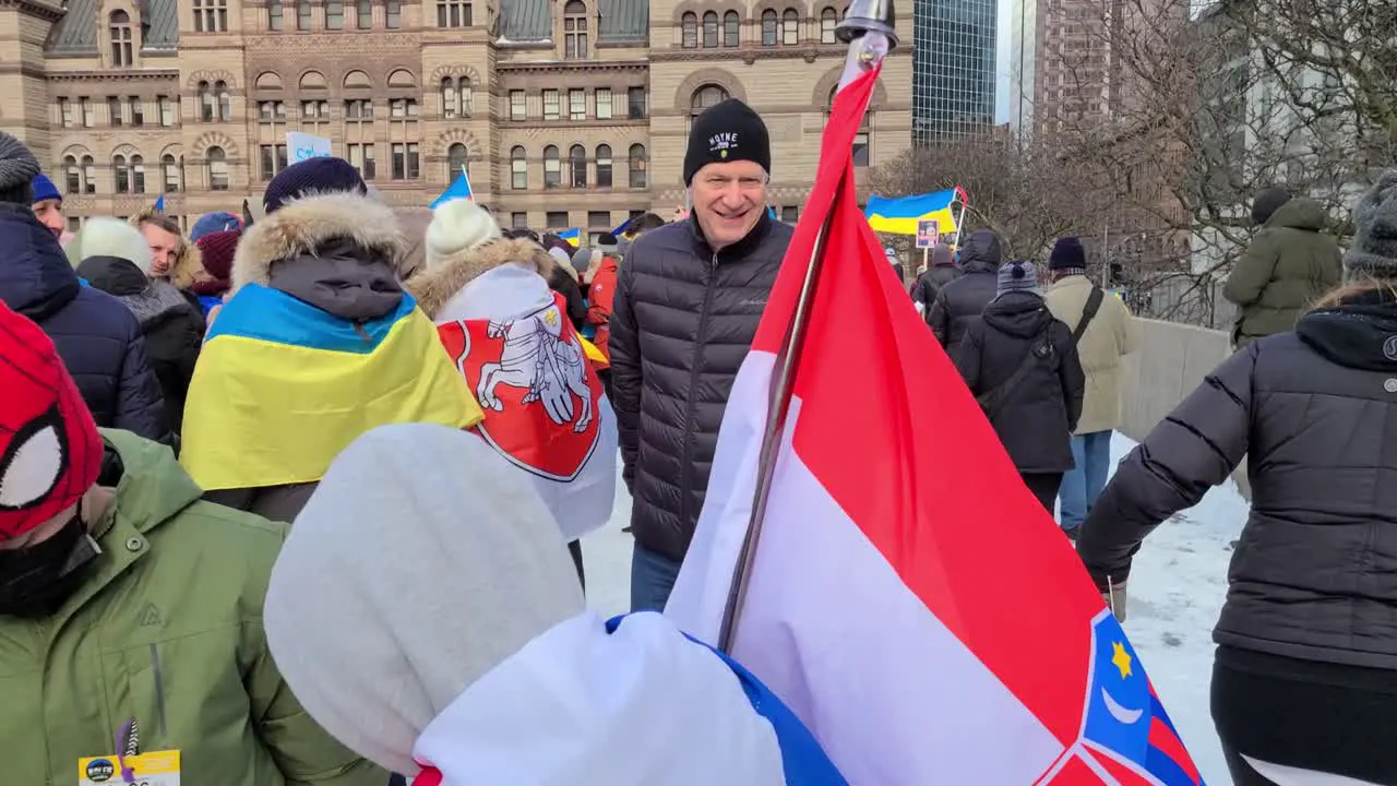 Crowded square during a protest against Russia’s invasion of Ukraine Downtown Toronto