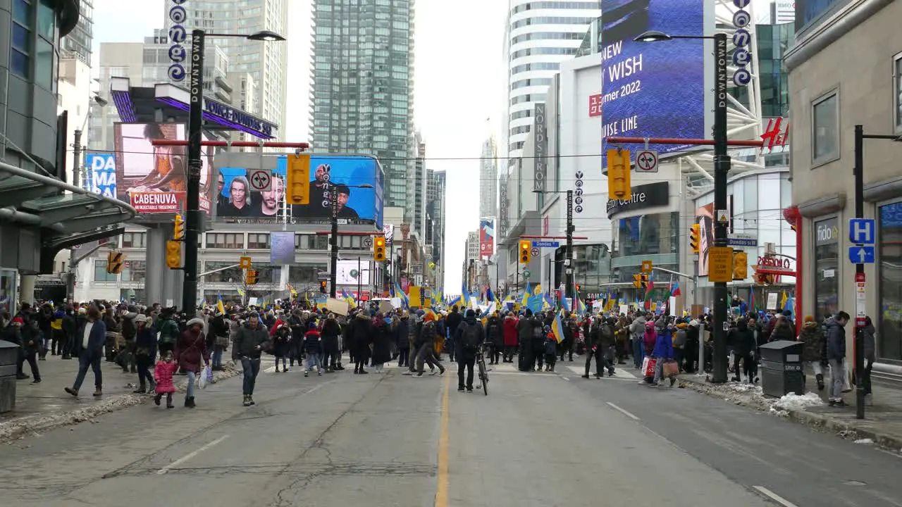 Downtown intersection Packed with Pro Ukraine people protesting Against Russian Invasion Toronto