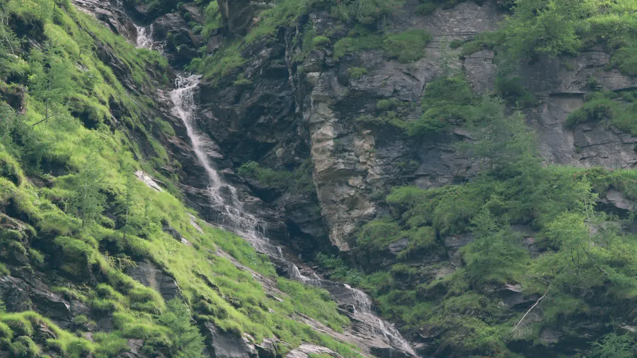 River running down a mountain rock