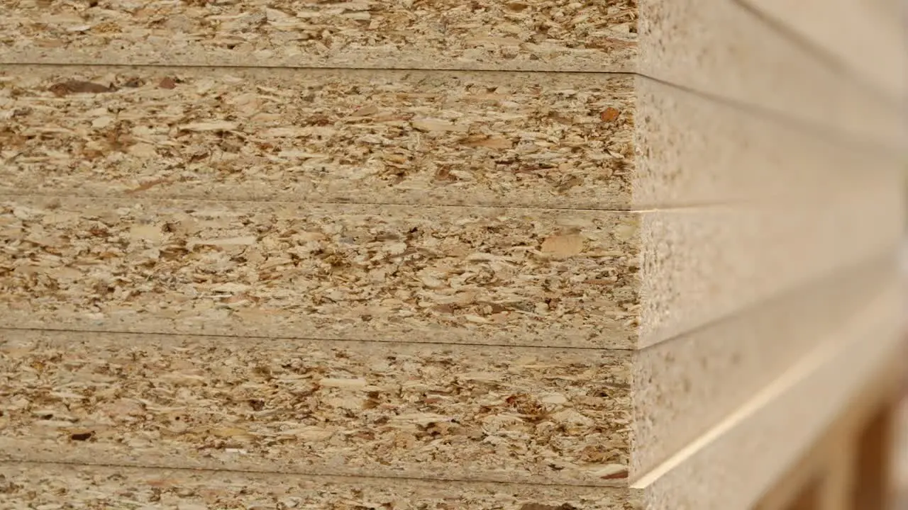 Slow motion and macro of wood chipboard corners