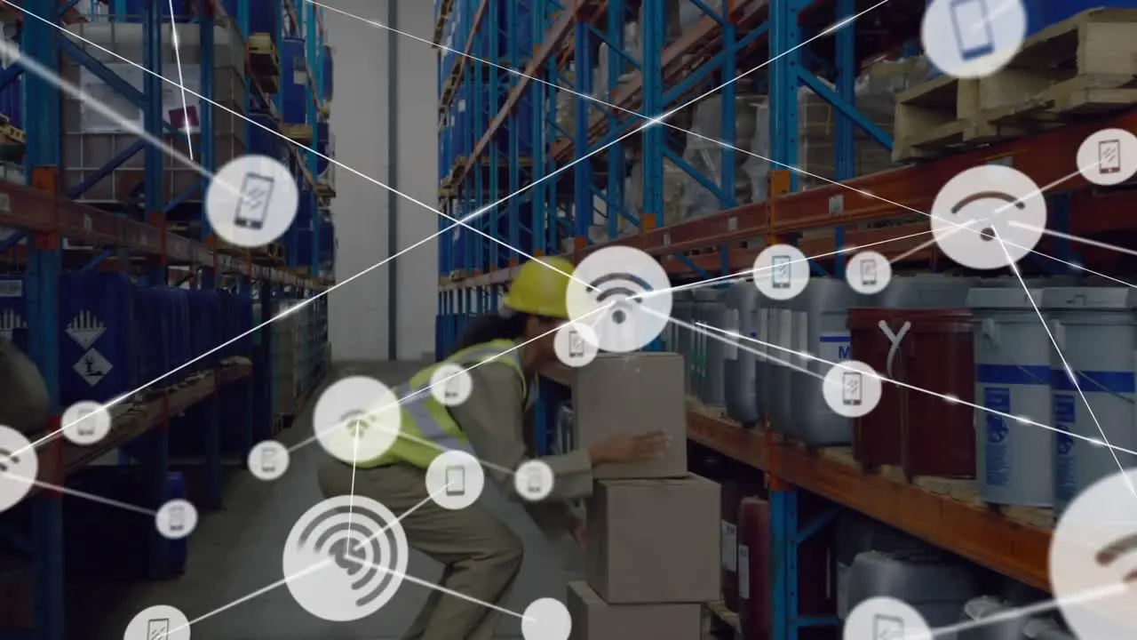 Animation of network of media icons over biracial female worker inspecting shelves at warehouse