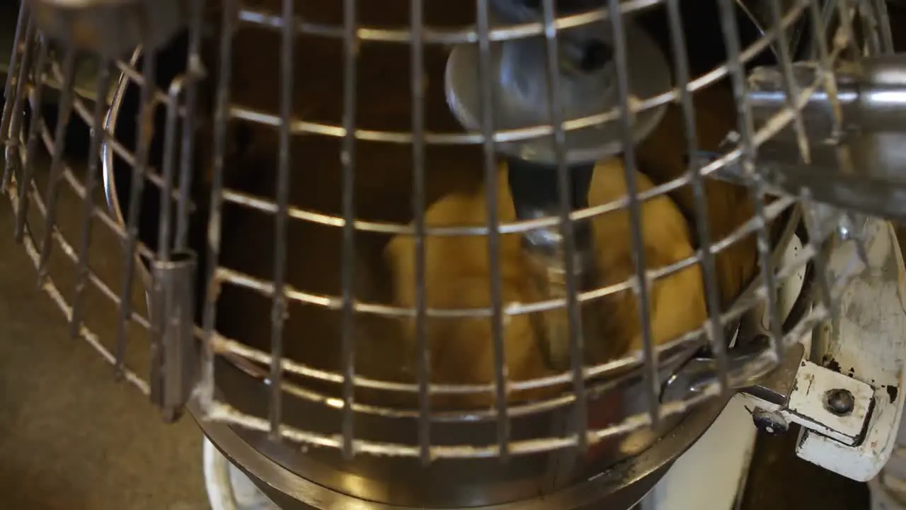 Dough being mixed in machine