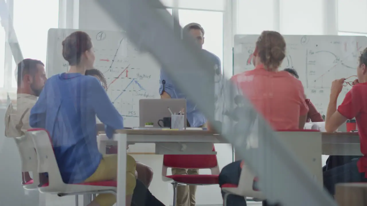 Creative people sitting table office Confident business leader talking people