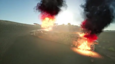 burned tank in the desert at sunset