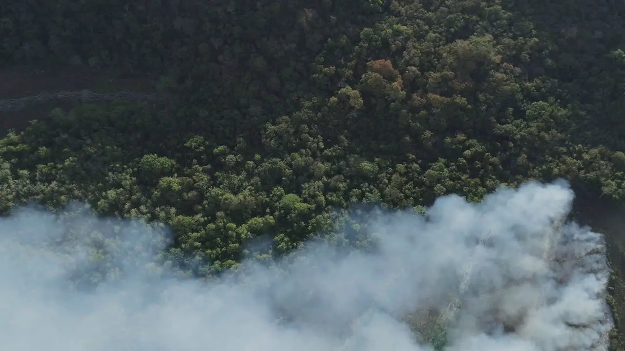 Amazonian forest fire in Brazil 2019 aerial drone shot full of smoke