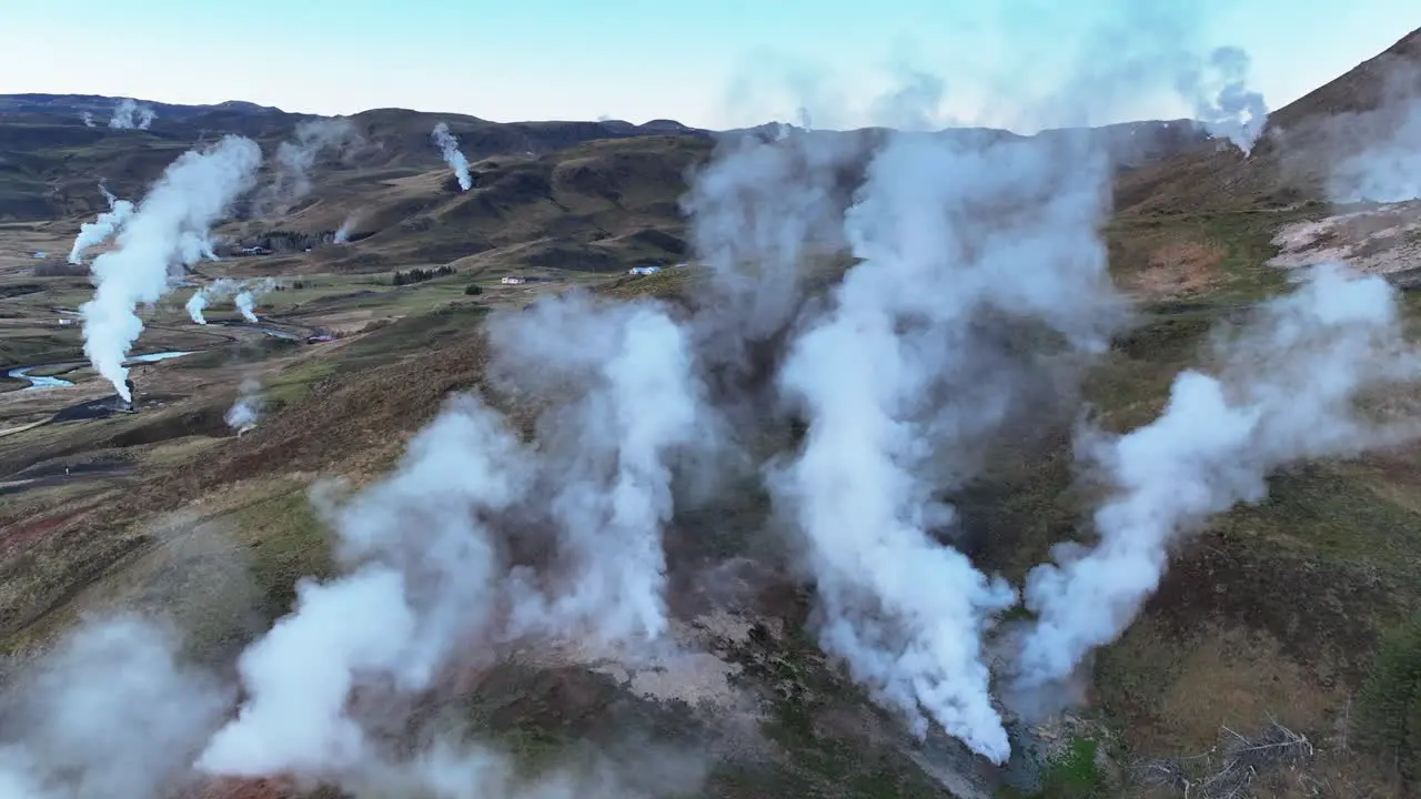 Steam Rising From Hot Springs In Geothermal Valley In Hveragerdi South Iceland Drone Shot