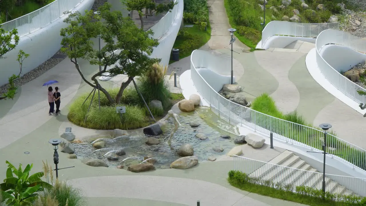 Korean Women With Umbrella Walking Near The Fountain At Geoje Belvedere Hotel Hanwha Resort In Geoje Korea In Summer