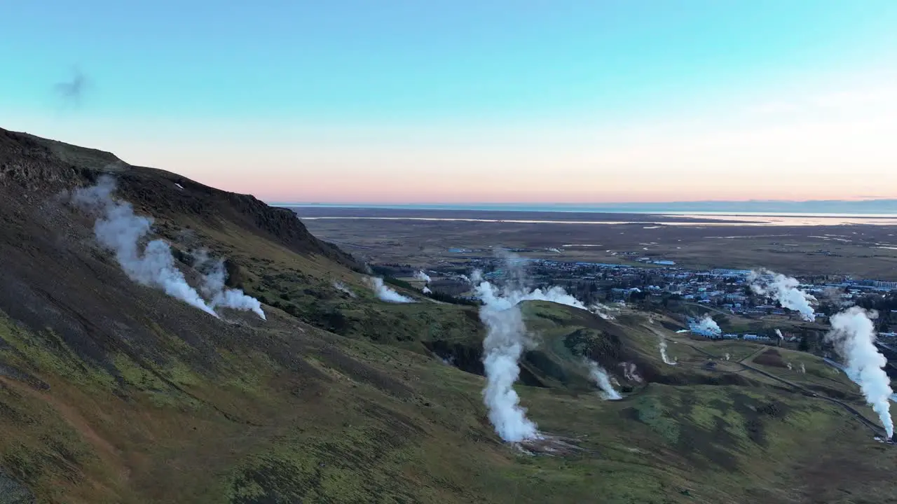 Steam Rising In Geothermal Area In Hveragerdi South Iceland Aerial Drone Shot