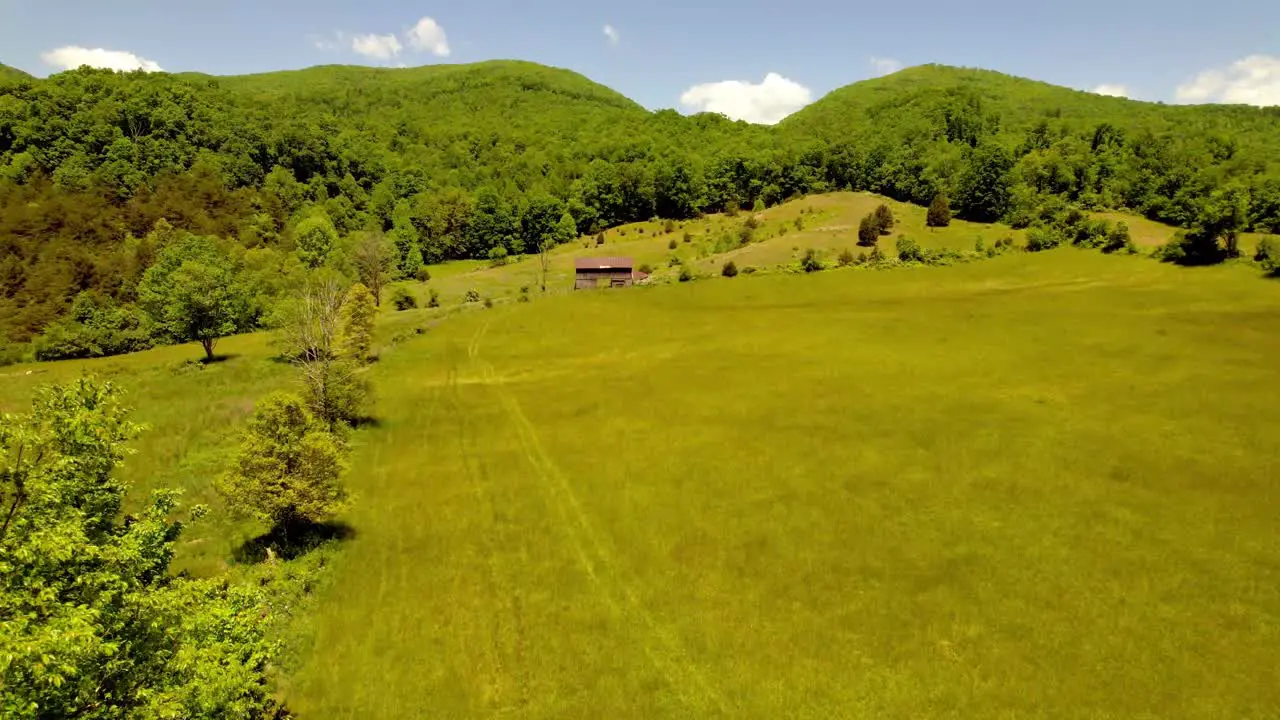 aerial low slow push into old barn on old farmplace near saltville virginia