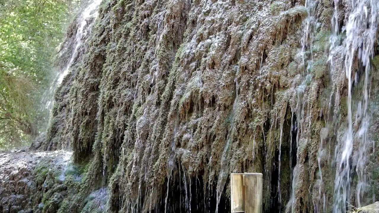 Rock wall covered on water flow