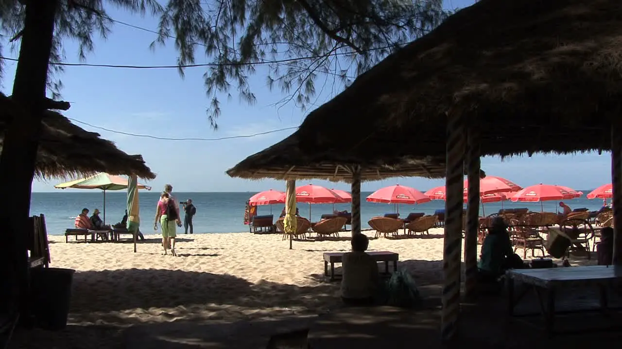 Cambodia a beach with umbrellas