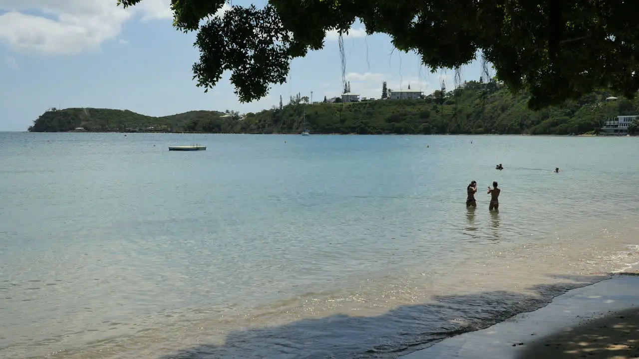 New Caledonia Noumea People In Tranquil Lagoon