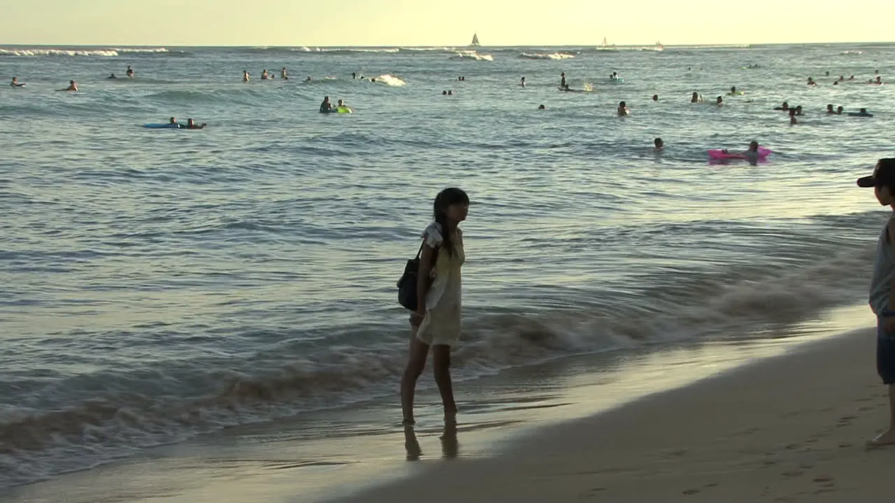 Waikiki girl with waves