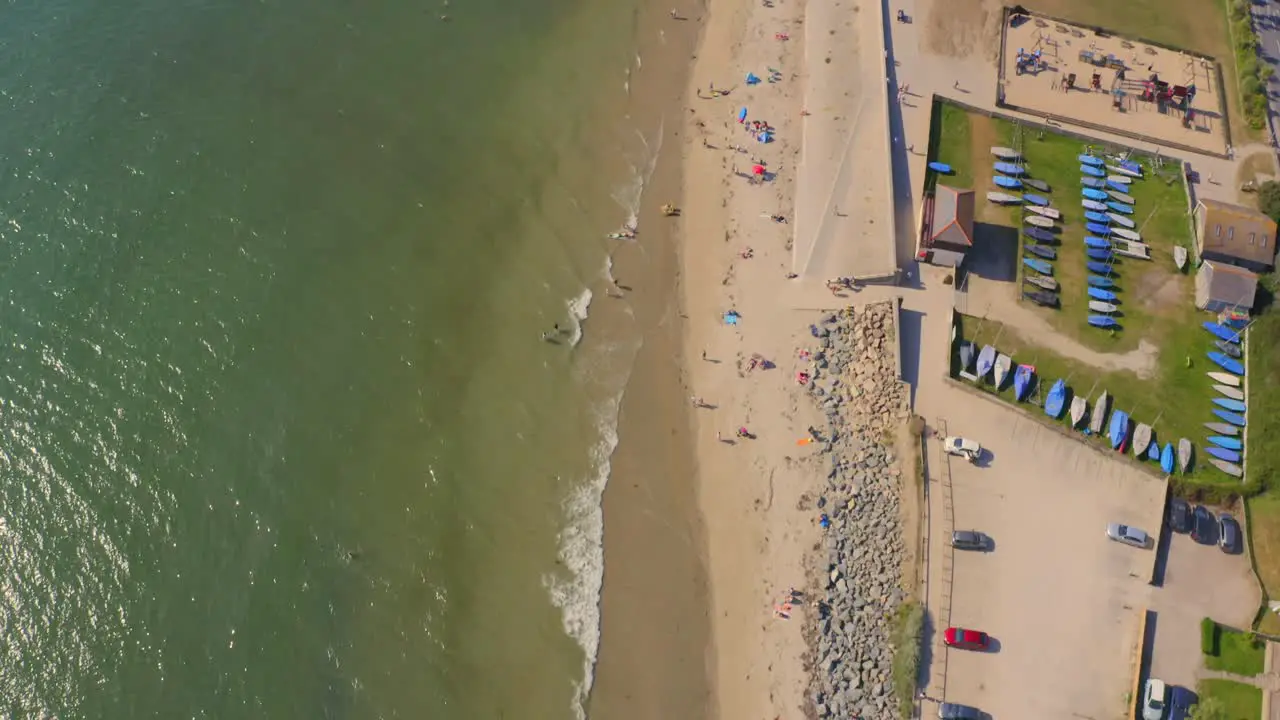 Aerial birdseye view over Marazion Beach in Cornwall England No recognizable people in the shot