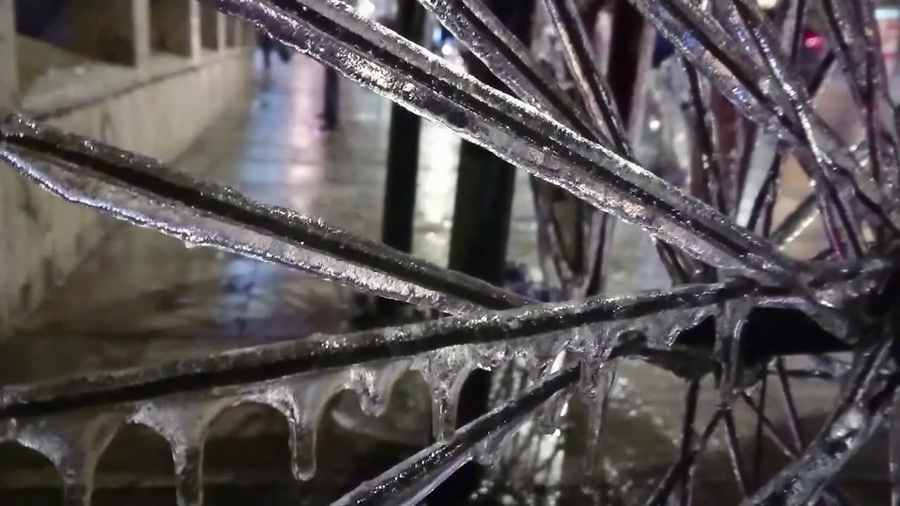 Bicycle covered in ice after frozen rain phenomenon