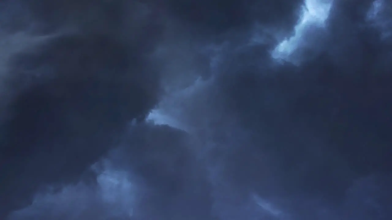 thunderstorm dark blue clouds in the sky with lightning strike