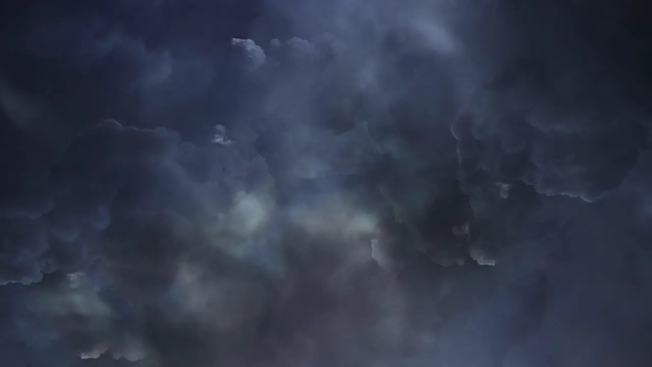 thunderstorm flying through into dark clouds with lightning strike