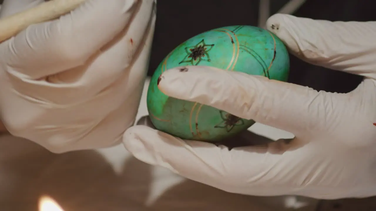 Drawing Easter eggs using the traditional Ukrainian technique Pysanka