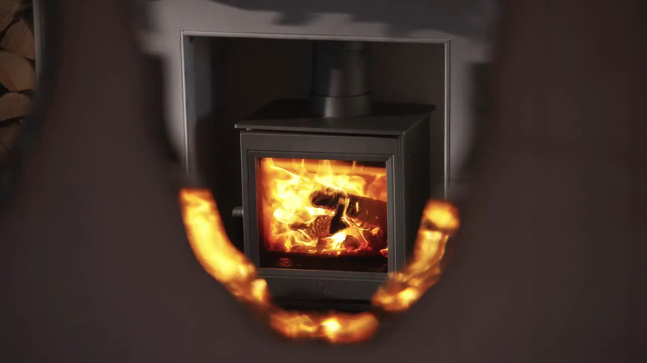 Burning stove in home fireplace