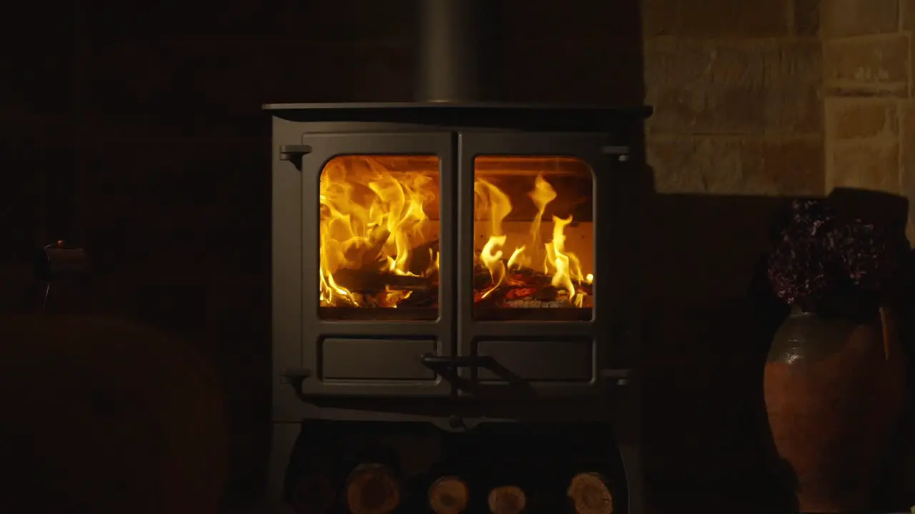 Bright flames in wood burning stove