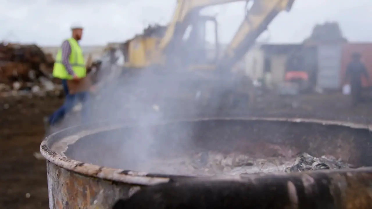 Metal scraps burning in the junkyard 4k