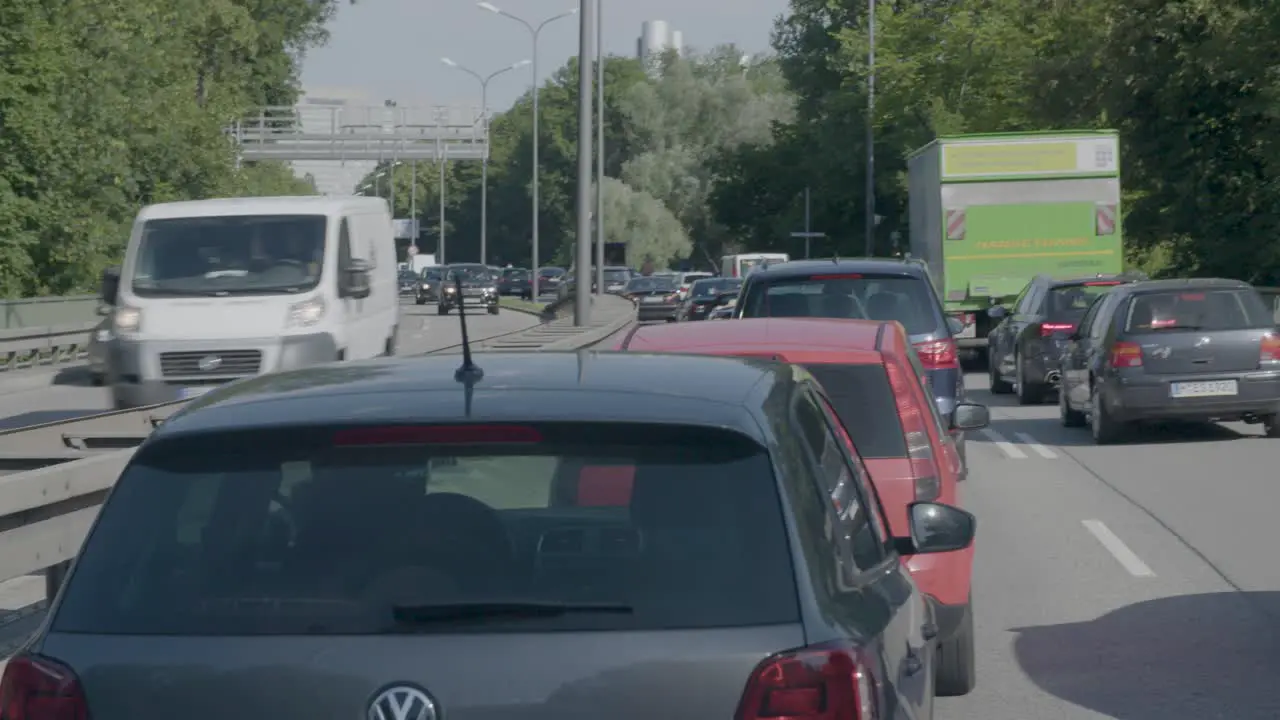 Cars slowly crawling in a traffic jam in Munich Germany