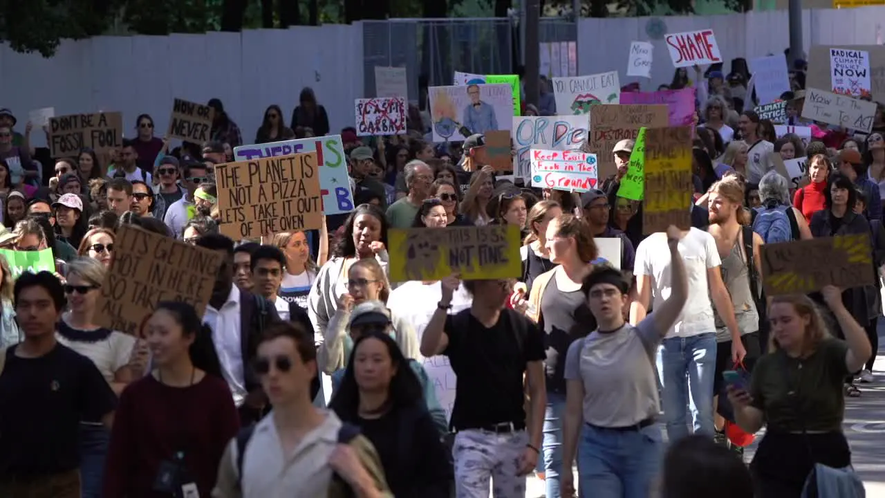 People marching against climate change slow motion