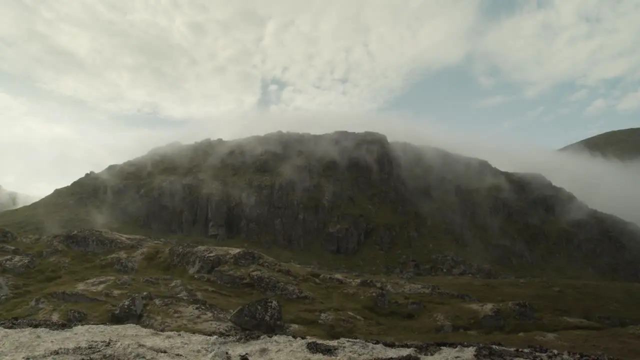 Fog moving over a mountain on the Lofoten in Norway