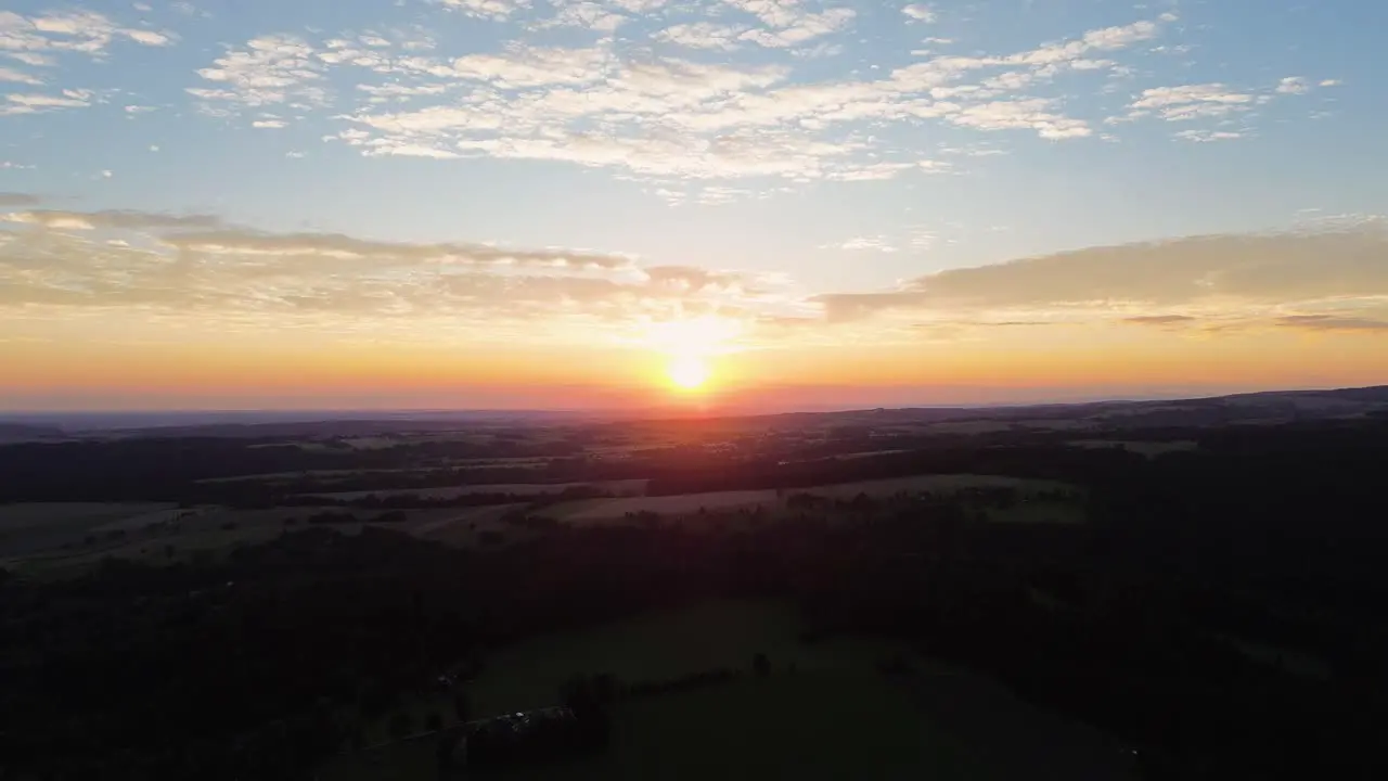 Mesmerizing golden sunset view from drone in mountains