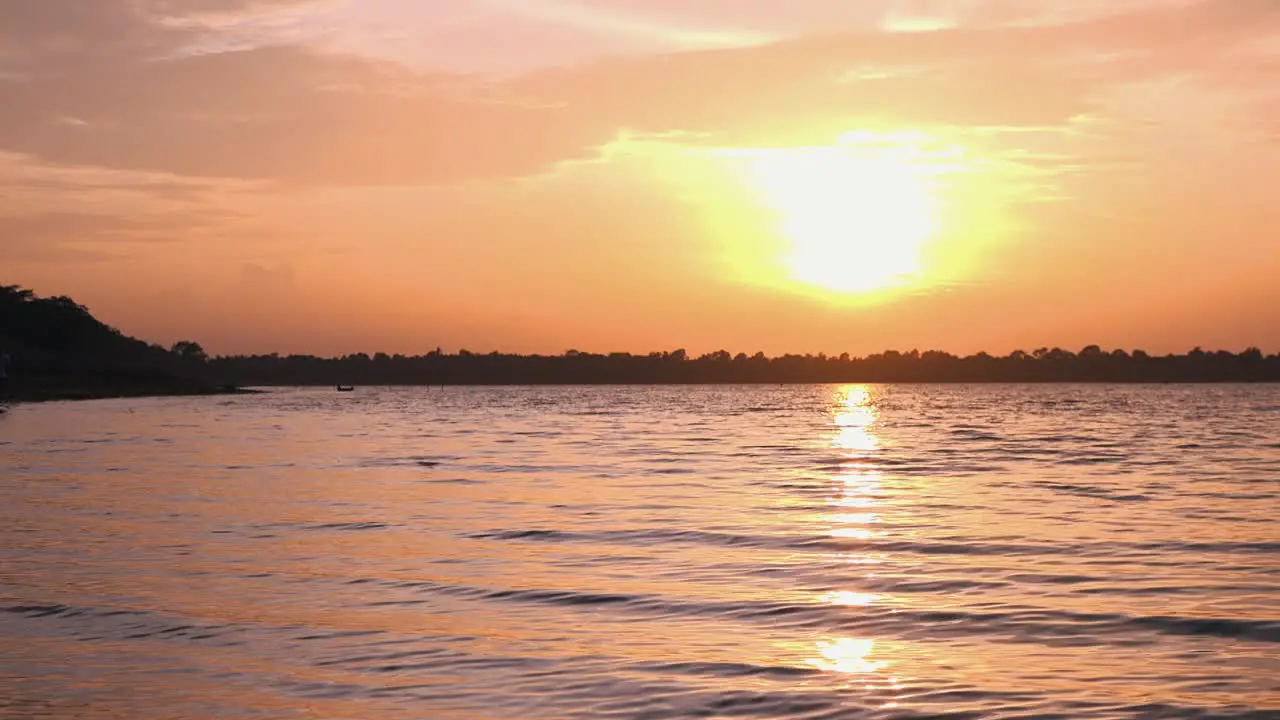 Beautiful Golden Sun Setting Over the Lake